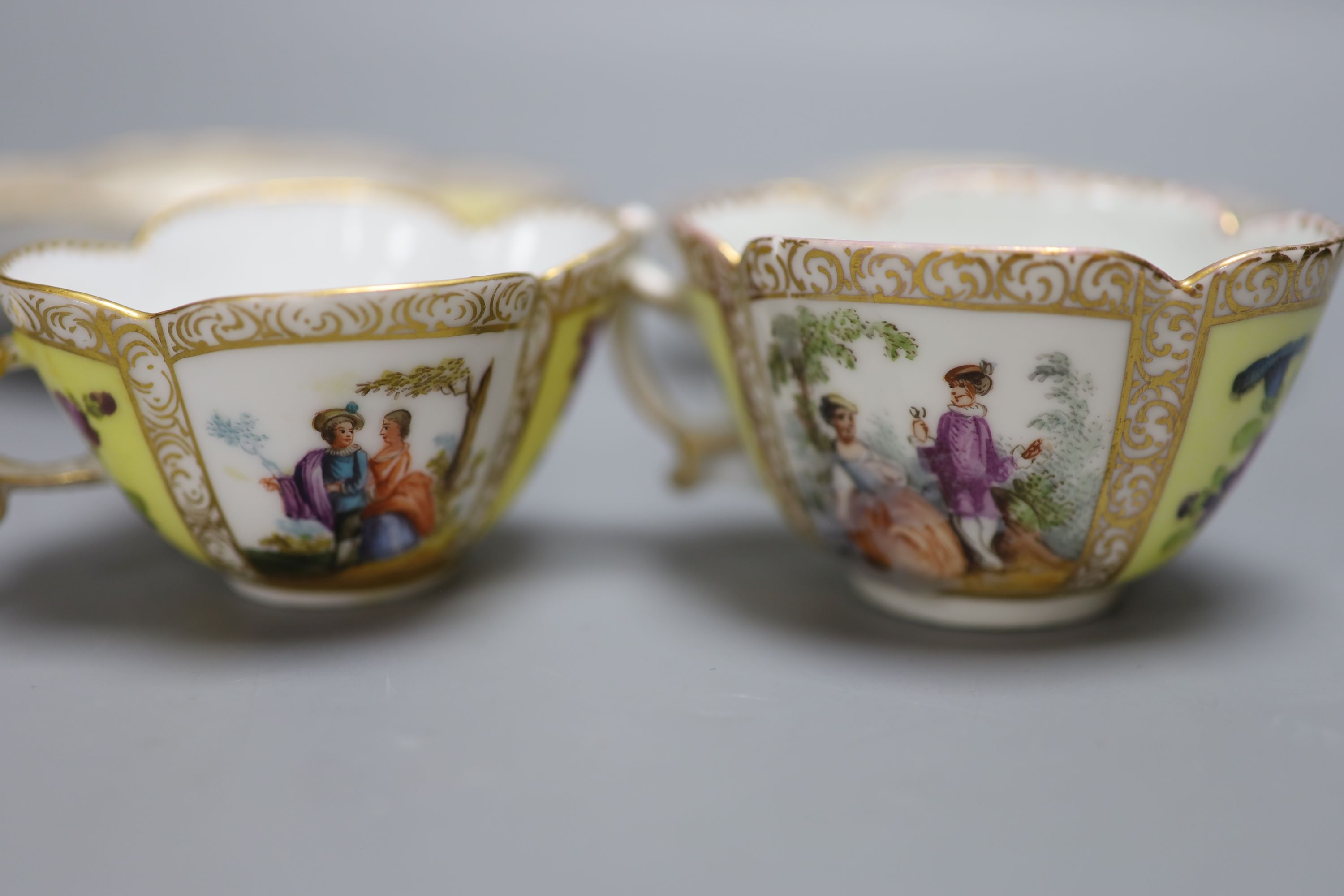 Two Dresden cups, one Dresden saucer and a Meissen saucer